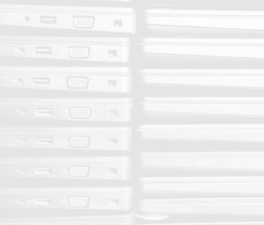 Two stacks of laptops side by side