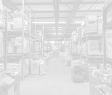 Large warehouse with various printers wrapped in plastic